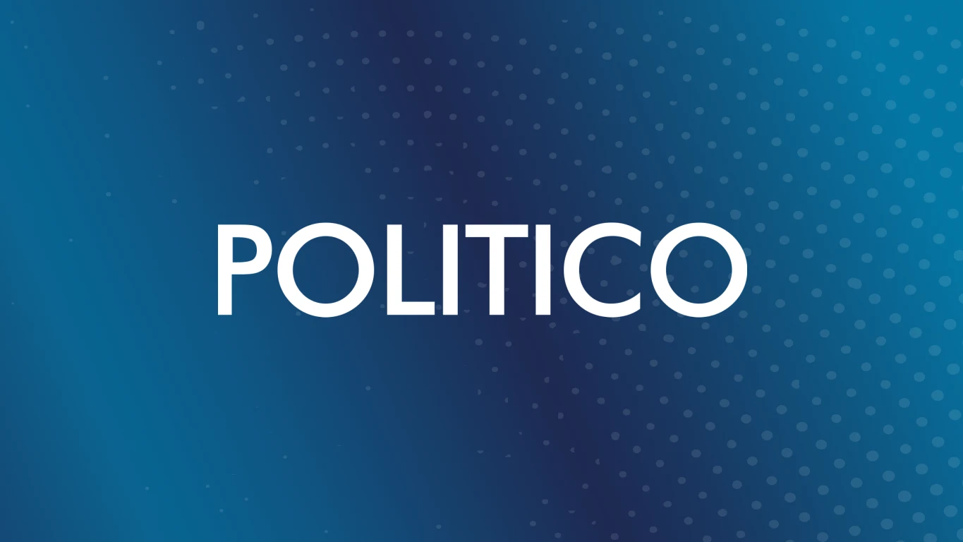 White Politico Logo on blue background