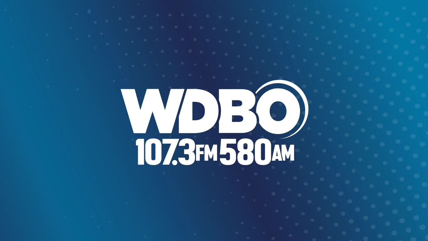 White WDBO 107.3FM 580AM logo on blue background