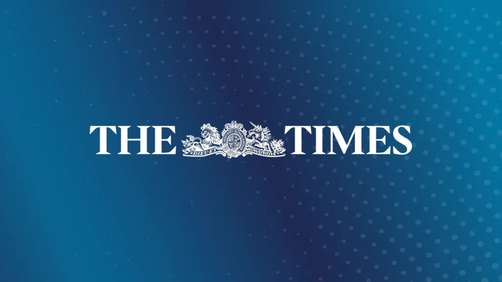 White THE TIMES Logo on blue background